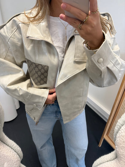 Glossy jacket with canvas